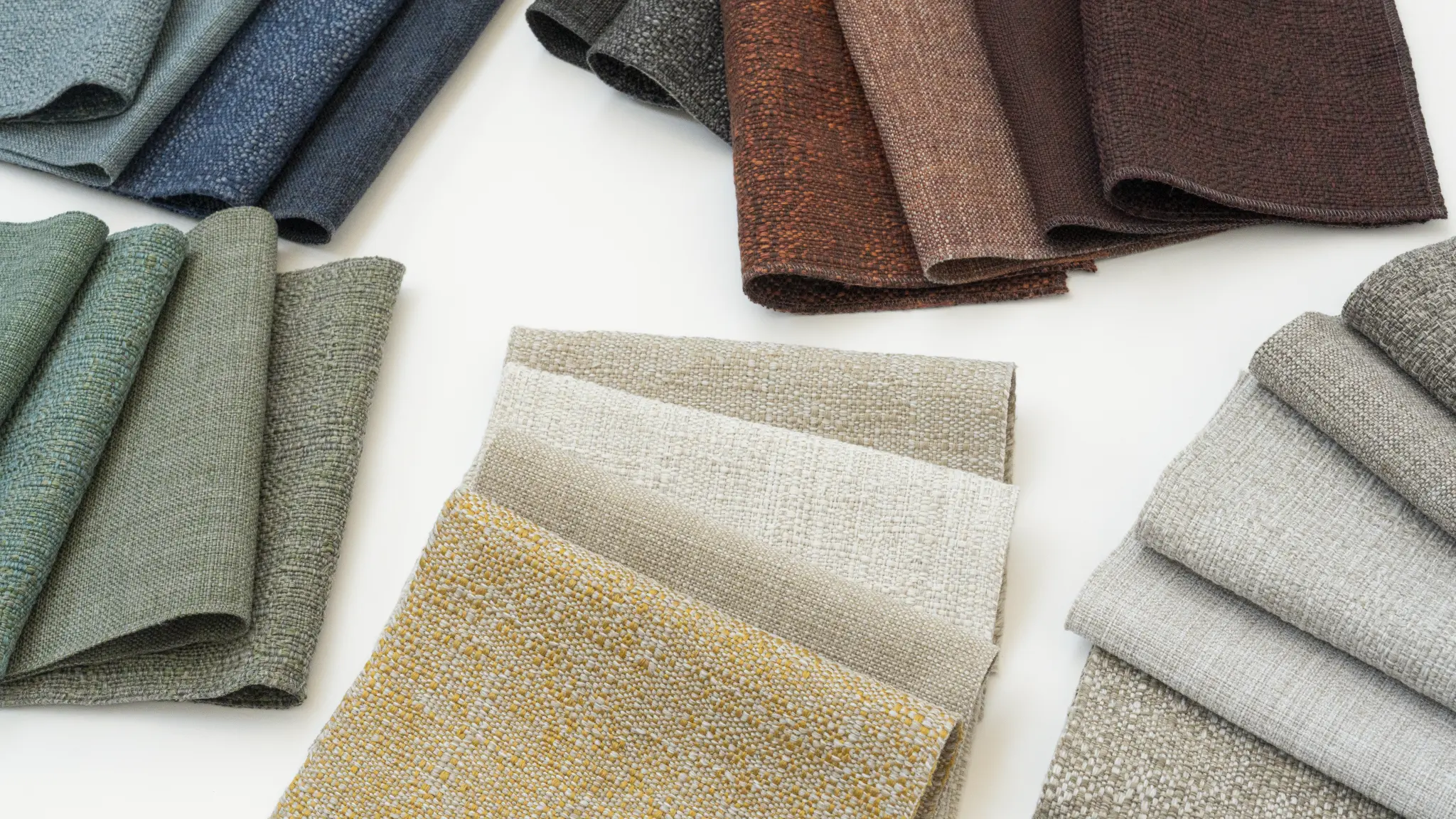 Laguna and Bay fabrics by Vescom in multiple colours highlighting irregular and two-tone weaves