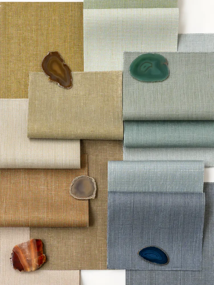 Samples of Vescom Gemstone woven textile wallcovering in gemstone-inspired colours showing the small grid texture