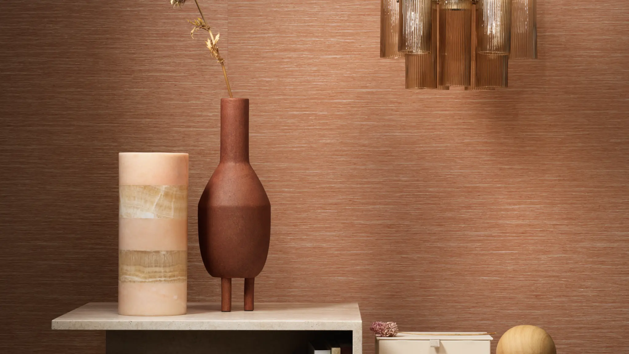 Vescom Ilara textile wallcovering with a crafted horizontal woven texture and subtle tonal variation, shown on interior walls in a warm styled interior setting